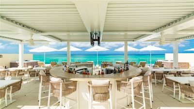 Hotel with outdoor bar at Beachfront at Windsong on the Reef