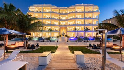 Beachfront at Windsong on the Reef exterior building at night