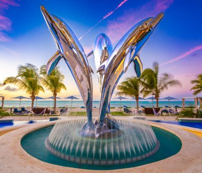 Beachfront at Windsong dolphin statue